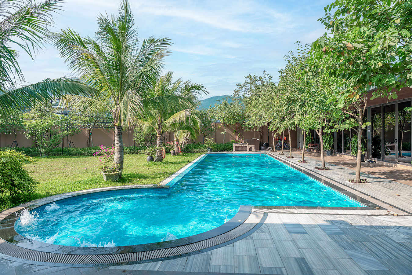 Private villas and pool at Flora Resort